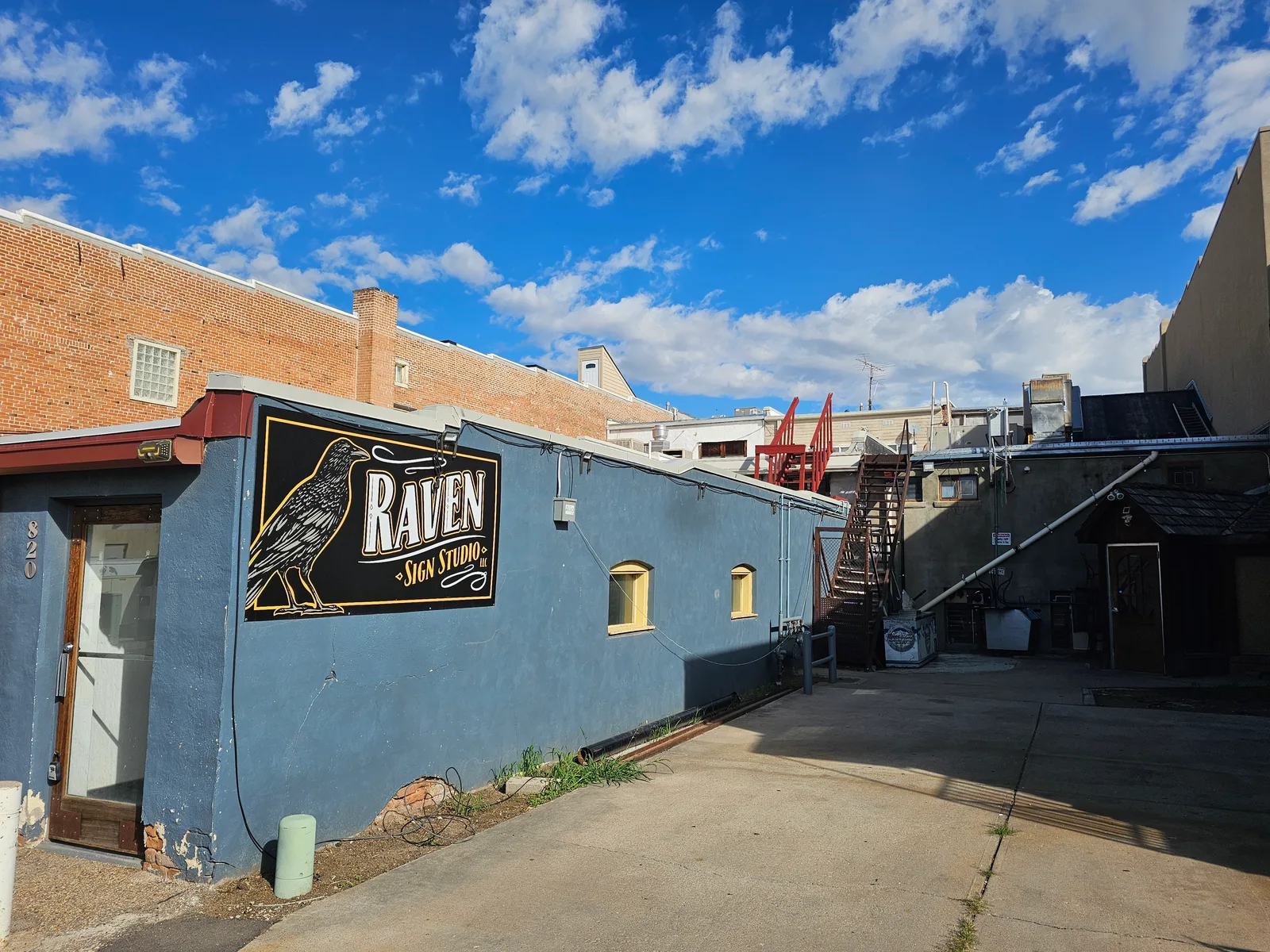 Raven Sign Co. on 9th Avenue, downtown Greeley.