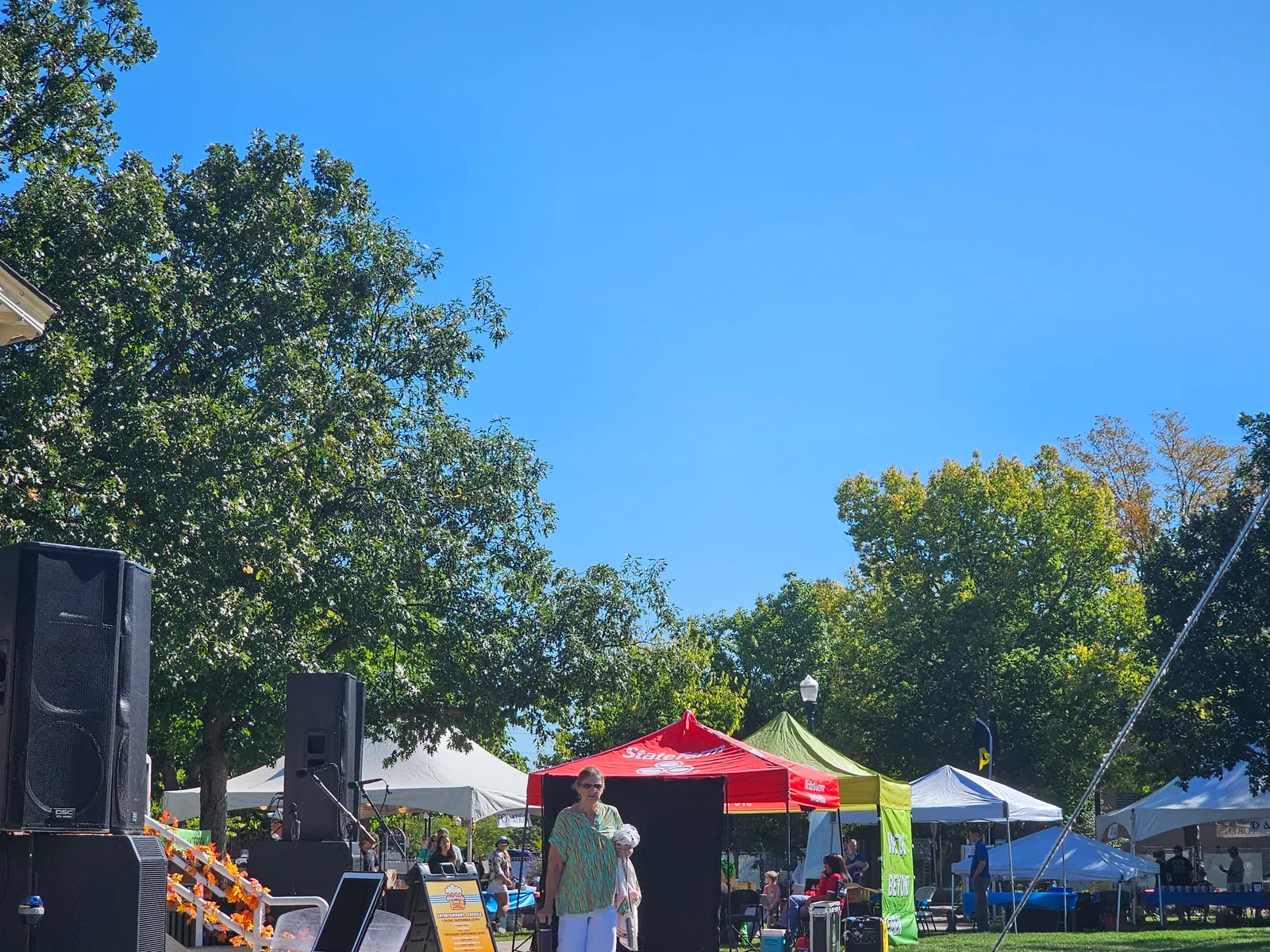 Vendor tents get ready for a busy Saturday at Oktobrewfest.