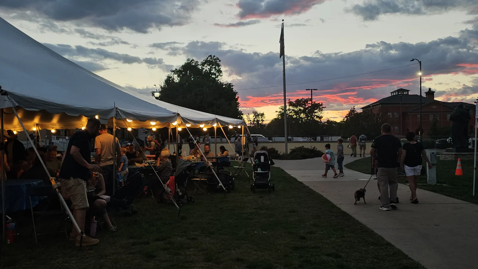 The beer tent with the sunset behind it.