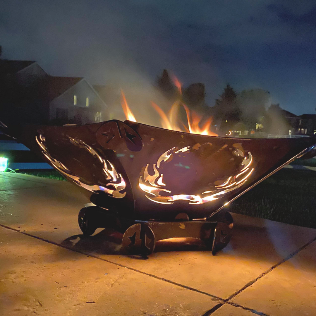 lit-up fire pit with dancing flames and smoke